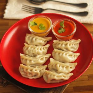 momos with spicy sauce